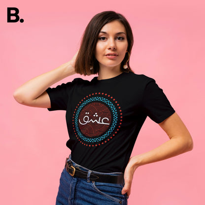Model wearing the black Ishq calligraphy tee with a red and turquoise circular print