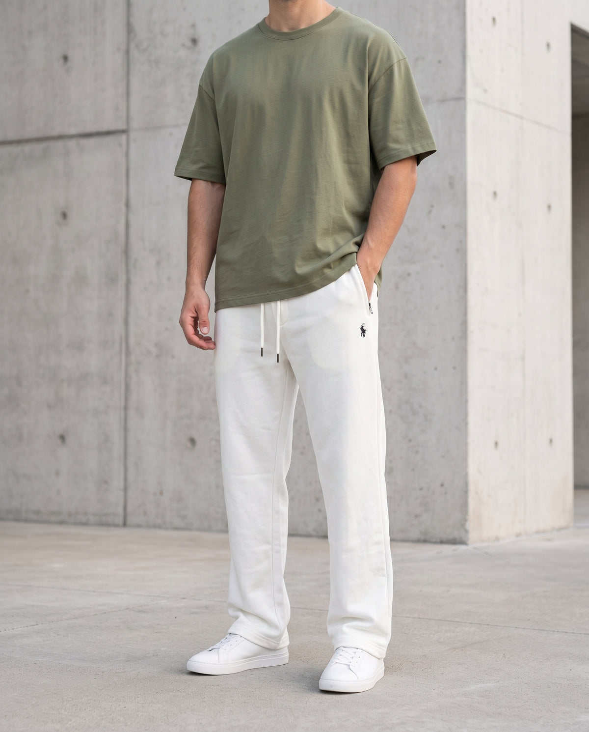 Egg White cotton terry trousers worn with an olive tee, relaxed straight-leg fit